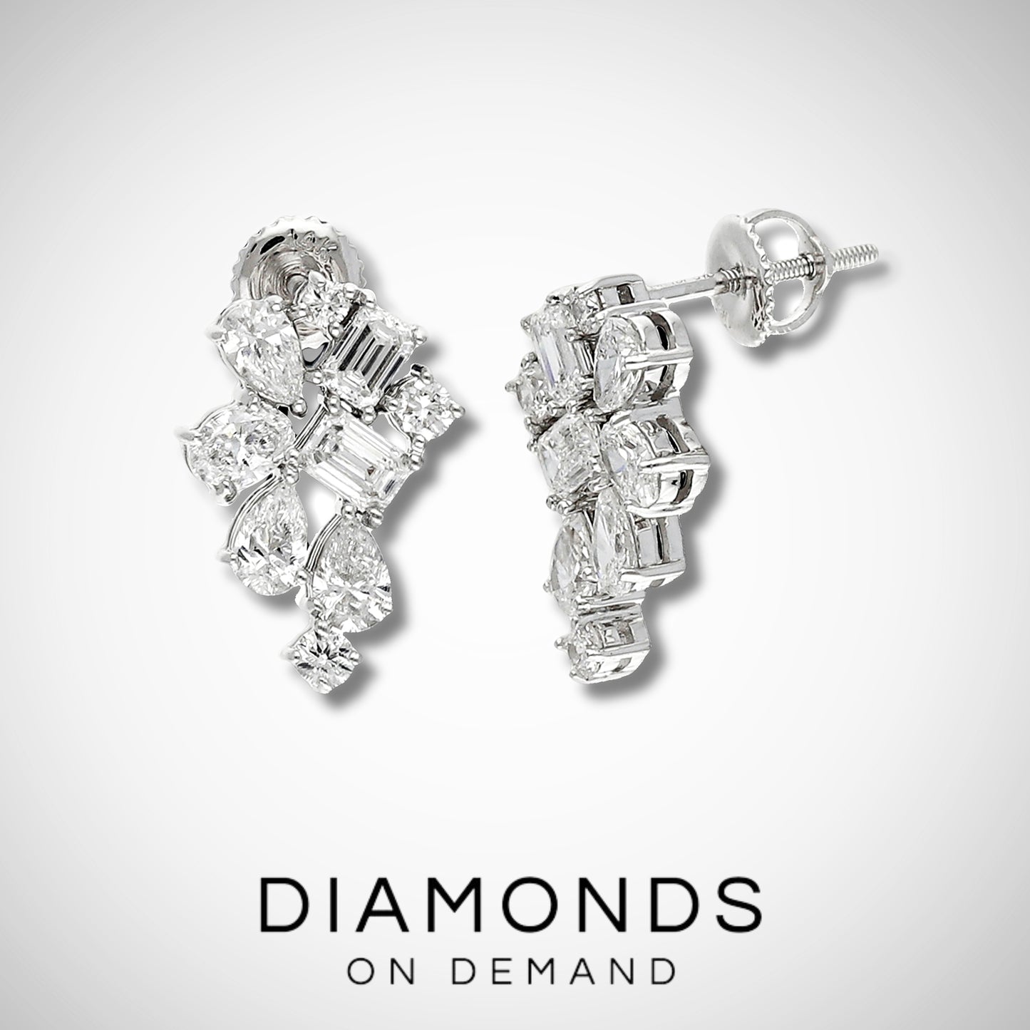 Clustered Pear Emerald & Round Diamond Dangle Earrings - White Gold
