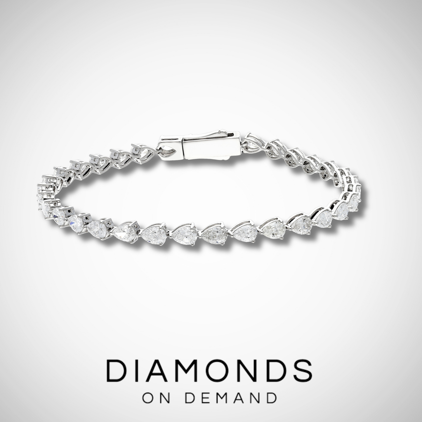 East to West Pear Cut Diamond Tennis Bracelet - White Gold